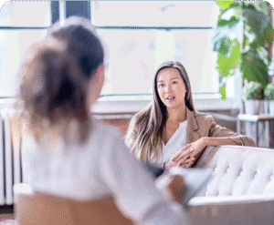 Norfolk clinic dietitian and therapist reviewing a patient’s care plan together